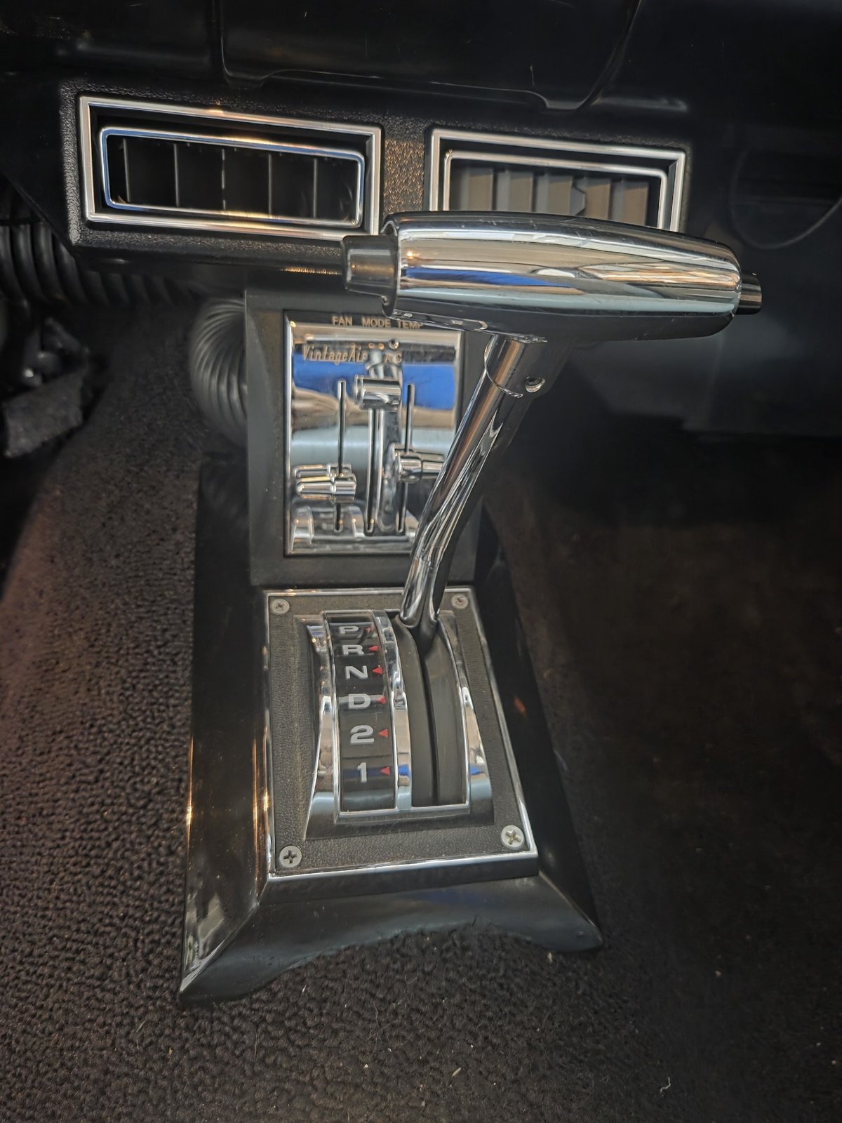 Custom center console with floor shifter and Vintage Air climate controls